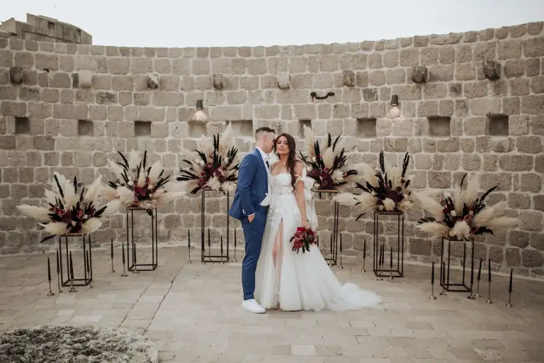Wedding ceremony at Bokar Fortress in Dubrovnik, Croatia, with panoramic Adriatic Sea views, historic stone walls, and a stunning outdoor setting for a destination wedding.