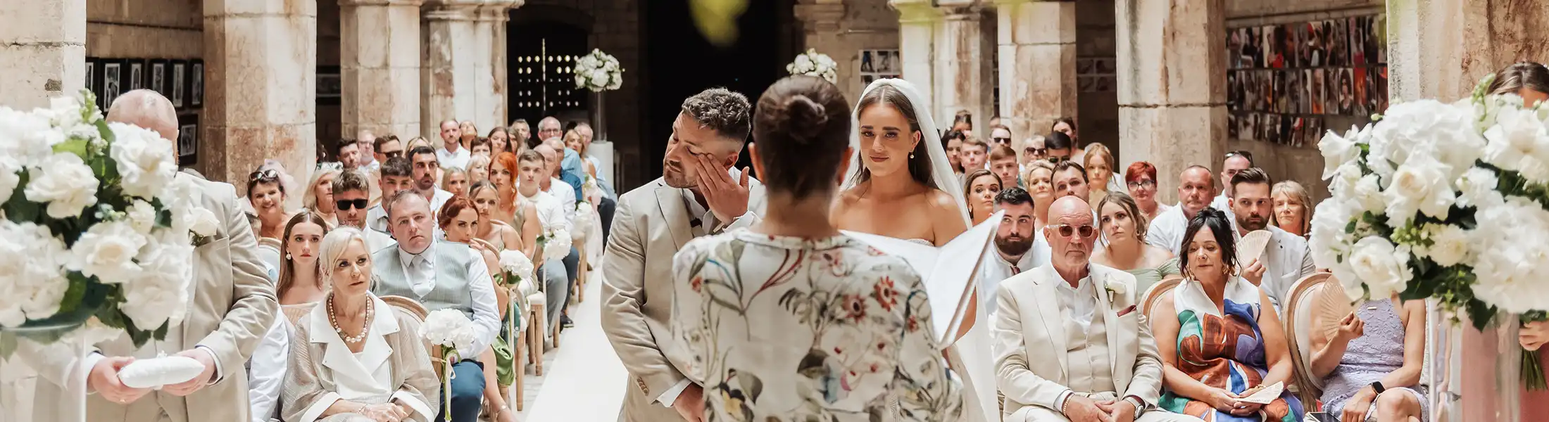Couple exchanging vows during a civil marriage ceremony in an elegant venue