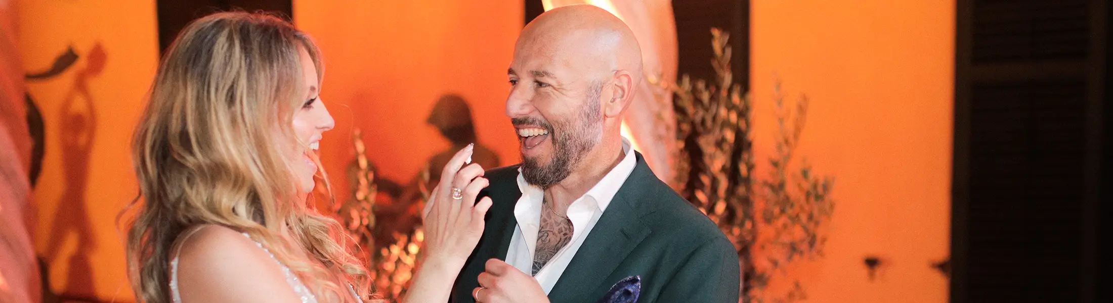 Couple feed each other wedding cake in Croatia Destination wedding